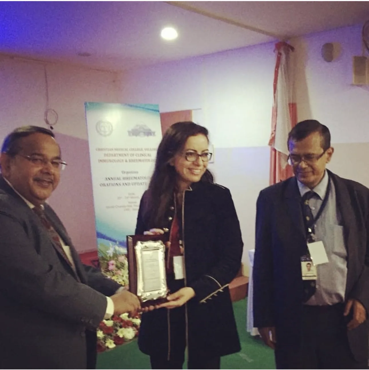 Dr Ghita Harifi receiving professional recognition.