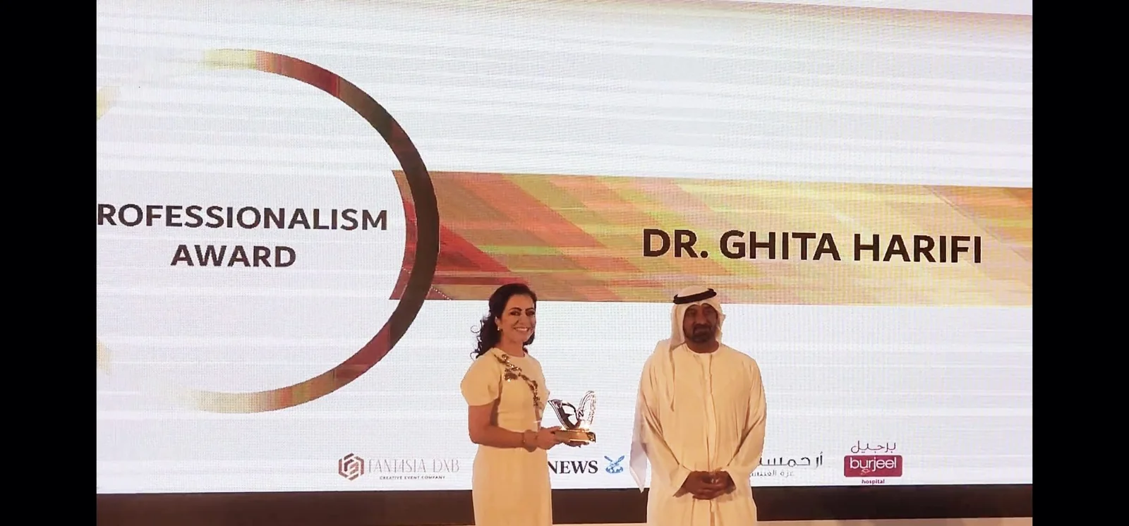 Professional recognition presented to Dr Ghita Harifi.