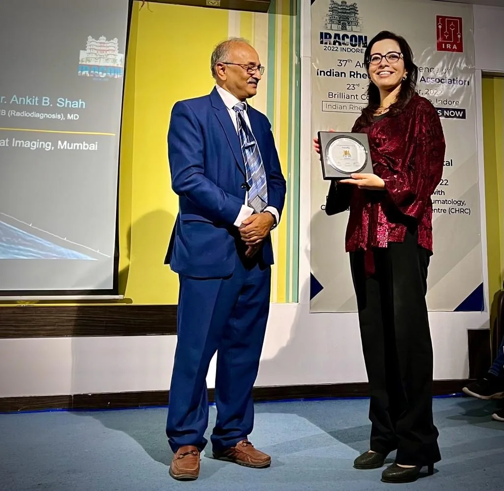 Dr Ghita Harifi at an international rheumatology event.