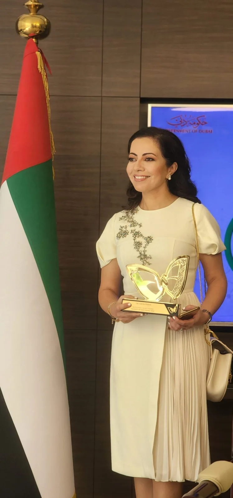 Dr Ghita Harifi speaking at a medical event.
